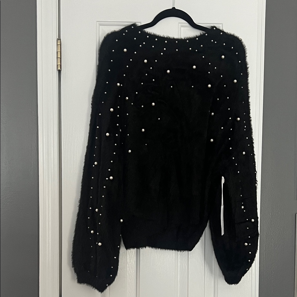 Chic Black Sweater with Pearl Detailing